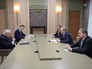 Президент России Владимир Путин и экс-госсекретарь США Генри Киссинджер во время встречи