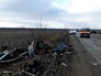 Мужчина у места подрыва на мине микроавтобуса в Донецкой области, Украина Мужчина у места подрыва на мине микроавтобуса в Донецкой области, Украина