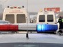 Машины полиции и скорой помощи на месте происшествия Машины полиции и скорой помощи на месте происшествия