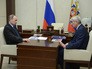 Президент России Владимир Путин и руководитель Федеральной службы по финансовому мониторингу Юрий Чиханчин во время встречи Президент России Владимир Путин и руководитель Федеральной службы по финансовому мониторингу Юрий Чиханчин во время встречи