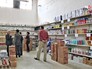 Покупатели в магазине в Сирии Покупатели в магазине в Сирии