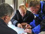 Президент России Владимир Путин во время осмотра района строительства Крымского моста Президент России Владимир Путин во время осмотра района строительства Крымского моста