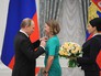 Президент России Владимир Путин и дизайнер Елена Чебурашкина на церемонии вручения в Кремле премии для молодых деятелей культуры Президент России Владимир Путин и дизайнер Елена Чебурашкина на церемонии вручения в Кремле премии для молодых деятелей культуры