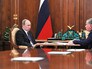Президент России Владимир Путин и глава компании "Роснефть" Игорь Сечин Президент России Владимир Путин и глава компании "Роснефть" Игорь Сечин