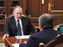 Президент России Владимир Путин и глава компании "Роснефть" Игорь Сечин Президент России Владимир Путин и глава компании "Роснефть" Игорь Сечин