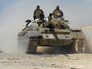 Бойцы сирийской армии во время наступления Бойцы сирийской армии во время наступления