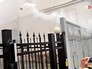Украинские радикалы бросают дымовые шашки Украинские радикалы бросают дымовые шашки