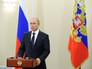Президент России Владимир Путин во время видеосвязи с сирийской Пальмирой перед началом концерта оркестра Мариинского театра под управлением Валерия Гергиева Президент России Владимир Путин во время видеосвязи с сирийской Пальмирой перед началом концерта оркестра Мариинского театра под управлением Валерия Гергиева