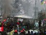 Активисты на Майдане в Киеве. Кадр из фильма "Маски революции" Активисты на Майдане в Киеве. Кадр из фильма "Маски революции"