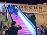 Президент России Владимир Путин спускается по трапу самолета Президент России Владимир Путин спускается по трапу самолета