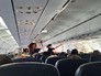 Стюардесса в самолете Стюардесса в самолете