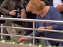 Цветы и свечи на месте стрельбы Цветы и свечи на месте стрельбы