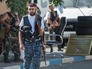 Член группы "Сасна црер" на территории захваченного полка патрульно постовой службы полиции района Эребуни в Ереване Член группы "Сасна црер" на территории захваченного полка патрульно постовой службы полиции района Эребуни в Ереване