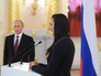 Двукратная олимпийская чемпионка Елена Исинбаева выступает на встрече президента России Владимира Путина с членами олимпийской сборной России Двукратная олимпийская чемпионка Елена Исинбаева выступает на встрече президента России Владимира Путина с членами олимпийской сборной России