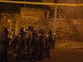 Протестующие во время столкновения с полицейскими на улице близ захваченного в Ереване здания полка патрульно-постовой службы Протестующие во время столкновения с полицейскими на улице близ захваченного в Ереване здания полка патрульно-постовой службы