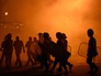 Полицейские во время столкновения с протестующими на улице близ захваченного в Ереване здания полка патрульно-постовой службы Полицейские во время столкновения с протестующими на улице близ захваченного в Ереване здания полка патрульно-постовой службы