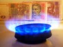 Украинские гривны и газовая горелка Украинские гривны и газовая горелка