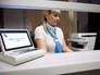 Сотрудница нового многофункционального центра Сотрудница нового многофункционального центра