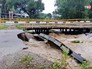 Разрушенный паводком мост Разрушенный паводком мост