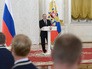 Президент России Владимир Путин во время встречи в Кремле с паралимпийской сборной России по летним видам спорта Президент России Владимир Путин во время встречи в Кремле с паралимпийской сборной России по летним видам спорта