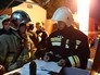 Сотрудники пожарной службы после ликвидации пожара на складском помещении в районе Гольяново на востоке Москвы Сотрудники пожарной службы после ликвидации пожара на складском помещении в районе Гольяново на востоке Москвы