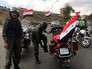 Сотрудники полиции готовятся к выходу мирных граждан и боевиков из восточного Алеппо Сотрудники полиции готовятся к выходу мирных граждан и боевиков из восточного Алеппо