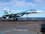 Истребитель Су-33 ВМФ России приземляется на авианосец "Адмирал Кузнецов" Истребитель Су-33 ВМФ России приземляется на авианосец "Адмирал Кузнецов"