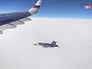 Истребители ВВС Швейцарии сопровождают российский самолет Истребители ВВС Швейцарии сопровождают российский самолет