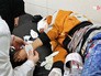 Пострадавшие при обстреле жилых кварталов в Сирии Пострадавшие при обстреле жилых кварталов в Сирии