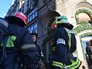 Сотрудники пожарной службы у здания ЦУМ в Москве Сотрудники пожарной службы у здания ЦУМ в Москве