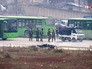 Автобусы в ожидании выхода боевиков из районов Алеппо Автобусы в ожидании выхода боевиков из районов Алеппо