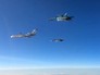 Ту-154 в сопровождении истребителей Ту-154 в сопровождении истребителей