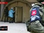 Сотрудник военной полиции России около мобильного госпиталя в Алеппо, Сирия Сотрудник военной полиции России около мобильного госпиталя в Алеппо, Сирия