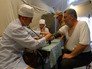 Житель Алеппо на приеме у врача на территории российского госпиталя Житель Алеппо на приеме у врача на территории российского госпиталя