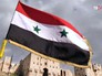 Флаг Сирии на фоне Цитадели в Алеппо Флаг Сирии на фоне Цитадели в Алеппо