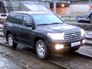 Toyota Land Cruiser с номерами серии "АМР" едет по трамвайным путям Toyota Land Cruiser с номерами серии "АМР" едет по трамвайным путям