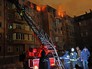 Сотрудники МЧС во врем тушения пожара в многоэтажном жилом доме в Краснодаре Сотрудники МЧС во врем тушения пожара в многоэтажном жилом доме в Краснодаре