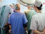 Российские военные хирурги проводят операцию в Сирии Российские военные хирурги проводят операцию в Сирии