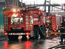 Пожарные машины на месте возгорания Пожарные машины на месте возгорания
