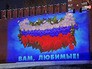 Проекция открытки с поздравлением с 8 марта на стене Кремля Проекция открытки с поздравлением с 8 марта на стене Кремля