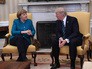 Президент США Дональд Трамп и канцлер Германии Ангела Меркель во время встречи Президент США Дональд Трамп и канцлер Германии Ангела Меркель во время встречи