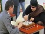Кирсан Илюмжинов играет в шахматы с Муаммаром Каддафи Кирсан Илюмжинов играет в шахматы с Муаммаром Каддафи