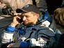 Космонавт Сергей Рыжиков после приземления Космонавт Сергей Рыжиков после приземления