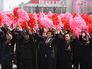 Граждане КНДР на параде по случаю 105-летия Ким Ир Сена Граждане КНДР на параде по случаю 105-летия Ким Ир Сена