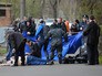 Криминалисты и работники полиции работают на месте убийства журналиста Олеся Бузины в Киеве Криминалисты и работники полиции работают на месте убийства журналиста Олеся Бузины в Киеве