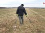 Мужчина с металлоискателем Мужчина с металлоискателем