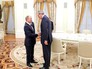 Президент России Владимир Путин и гендиректор, председатель правления нефтегазового концерна "ОМФау" Райнер Зеле Президент России Владимир Путин и гендиректор, председатель правления нефтегазового концерна "ОМФау" Райнер Зеле