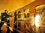 Пожарные на месте возгорания Пожарные на месте возгорания
