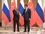 Президент РФ Владимир Путин и председатель КНР Си Цзиньпин Президент РФ Владимир Путин и председатель КНР Си Цзиньпин