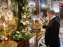 Владимир Путин ставит свечу к иконе святителя Николая Чудотворца в Храме Христа Спасителя Владимир Путин ставит свечу к иконе святителя Николая Чудотворца в Храме Христа Спасителя